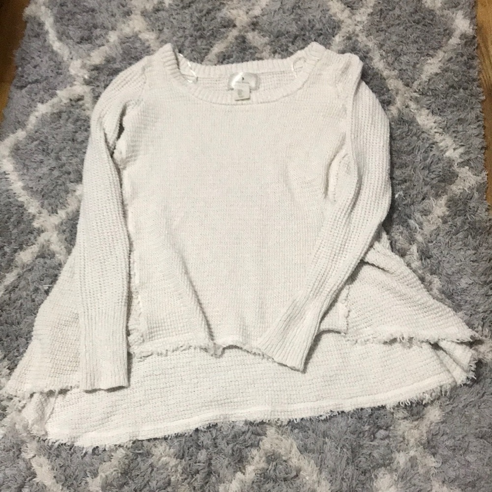 High low raw edged sweater